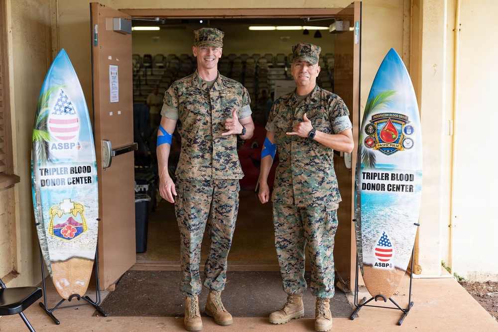 Col. Jeremy Beaven and Sgt. Maj. Adan Moreno donate to save lives