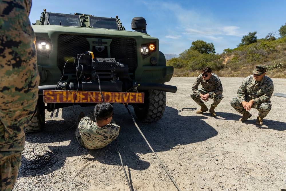 U.S. Marines take the wheel during JLTV operator course