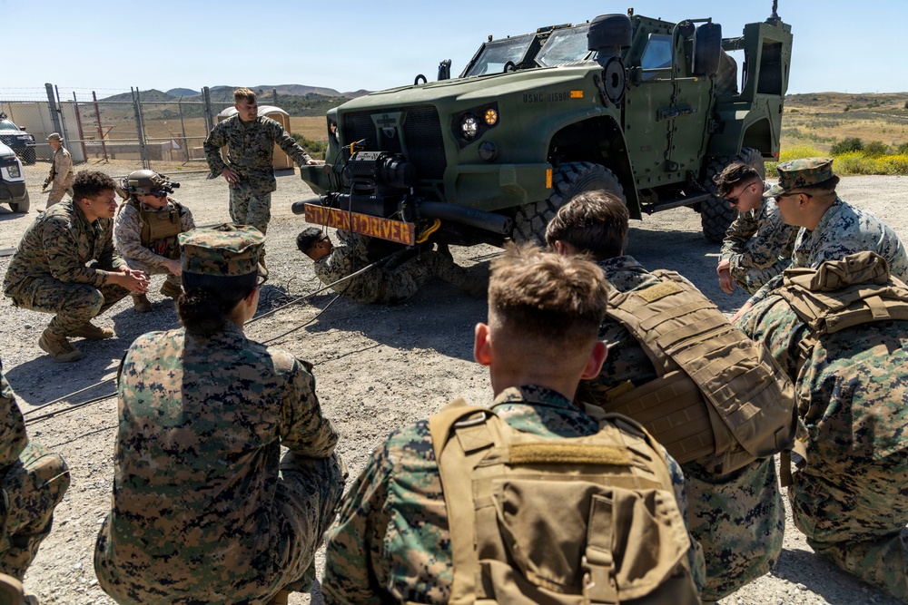 U.S. Marines take the wheel during JLTV operator course