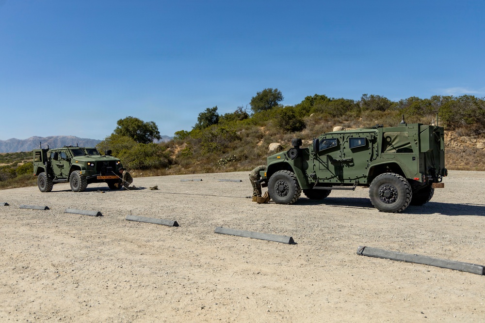 U.S. Marines take the wheel during JLTV operator course