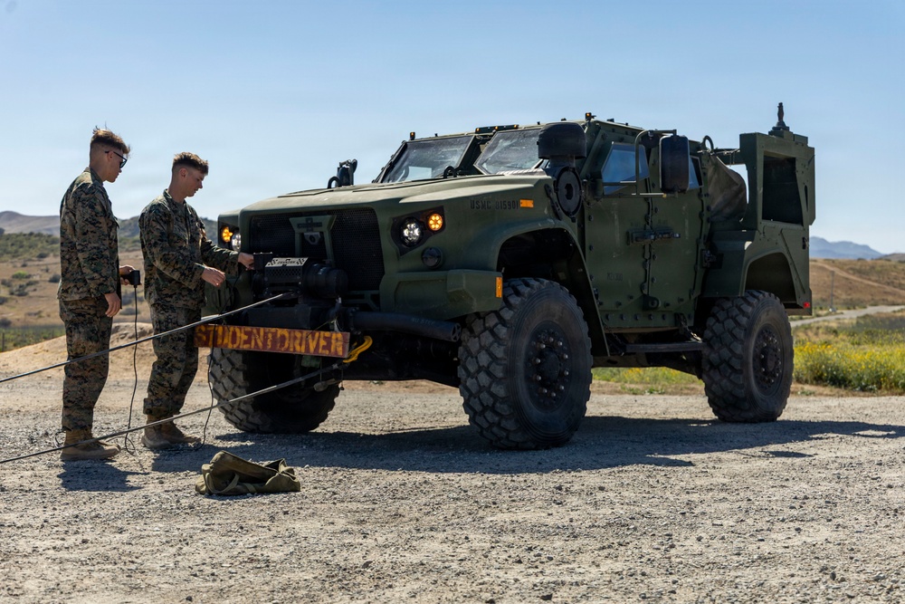 U.S. Marines take the wheel during JLTV operator course