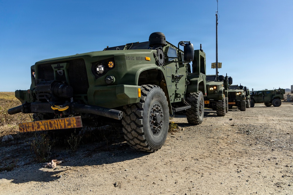 U.S. Marines take the wheel during JLTV operator course