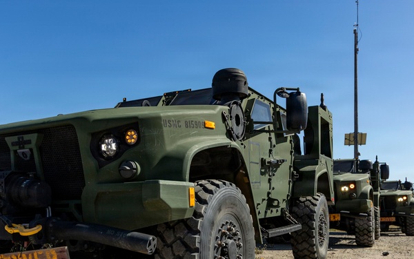 U.S. Marines take the wheel during JLTV operator course