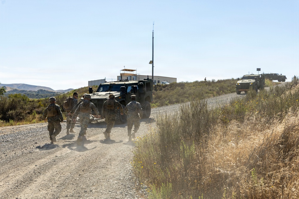 U.S. Marines take the wheel during JLTV operator course
