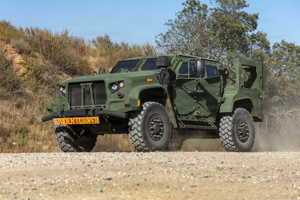 U.S. Marines take the wheel during JLTV operator course