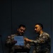 Allied Trade Specialists from 1st Special Forces Group (Airborne) exchange knowledge with I Corps