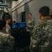 Allied Trade Specialists from 1st Special Forces Group (Airborne) exchange knowledge with I Corps