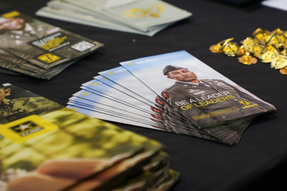 U.S. Army ROTC recruitment brochures displayed at a military outreach table
