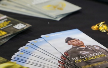 U.S. Army ROTC recruitment brochures displayed at a military outreach table