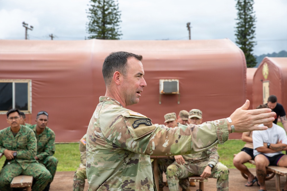 U.S. Soldiers and partner forces participate in brief prior to PLFTRC