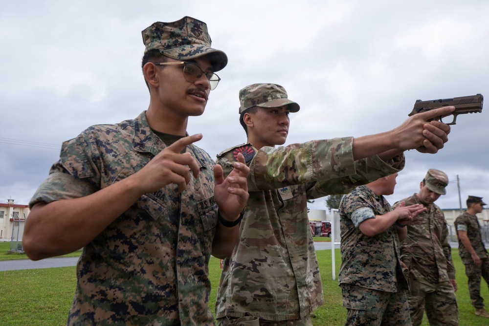 3rd Maintenance Battalion Combat Marksmanship Coaches Provide Pistol Familiarization to Space Force 161 Electromagnetic Warfare Combat Detachment