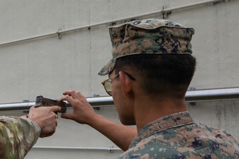 3rd Maintenance Battalion Combat Marksmanship Coaches Provide Pistol Familiarization to Space Force 161 Electromagnetic Warfare Combat Detachment