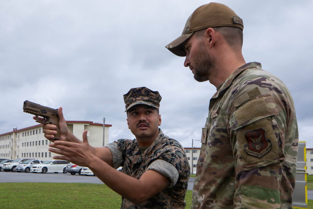 3rd Maintenance Battalion Combat Marksmanship Coaches Provide Pistol Familiarization to Space Force 161 Electromagnetic Warfare Combat Detachment