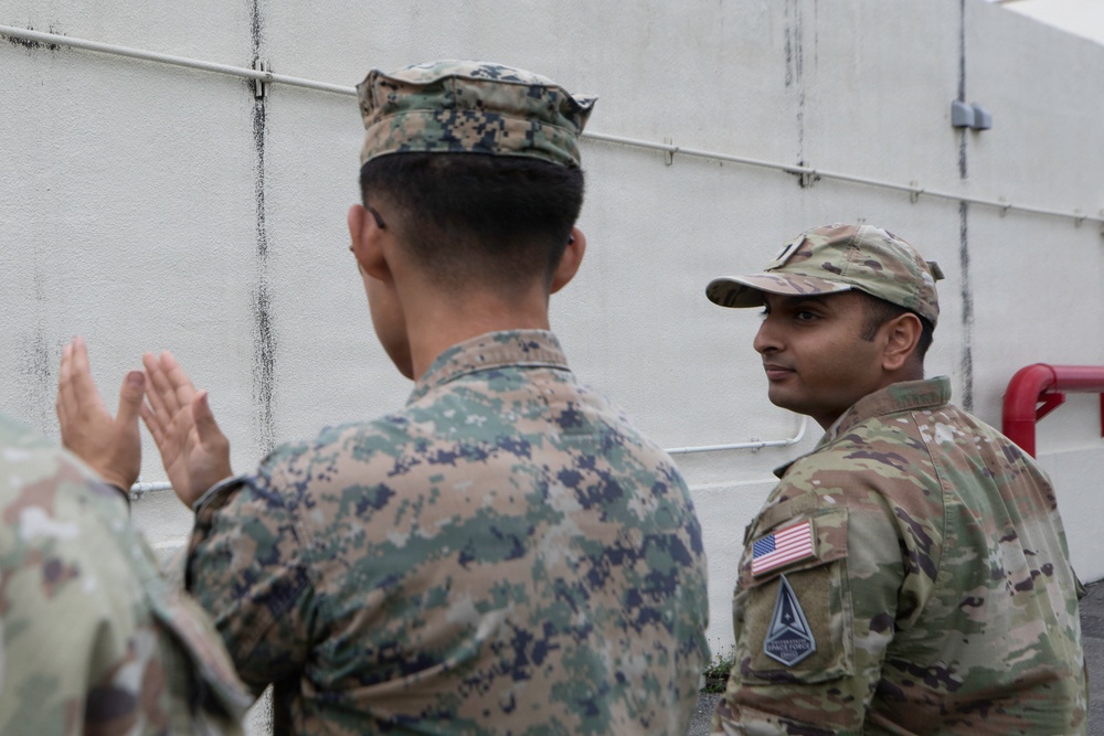 3rd Maintenance Battalion Combat Marksmanship Coaches Provide Pistol Familiarization to Space Force 161 Electromagnetic Warfare Combat Detachment