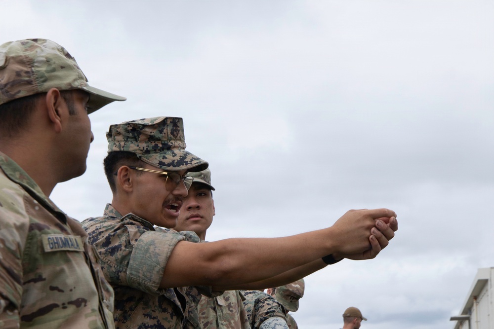 3rd Maintenance Battalion Combat Marksmanship Coaches Provide Pistol Familiarization to Space Force 161 Electromagnetic Warfare Combat Detachment