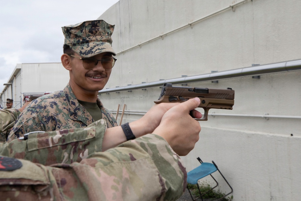 3rd Maintenance Battalion Combat Marksmanship Coaches Provide Pistol Familiarization to Space Force 161 Electromagnetic Warfare Combat Detachment