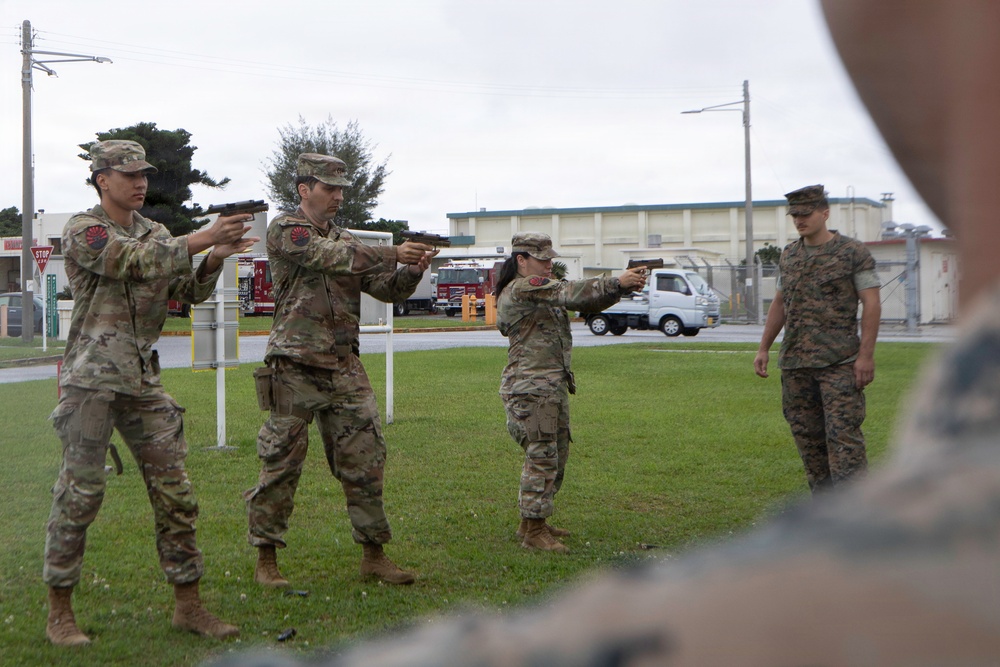 3rd Maintenance Battalion Combat Marksmanship Coaches Provide Pistol Familiarization to Space Force 161 Electromagnetic Warfare Combat Detachment