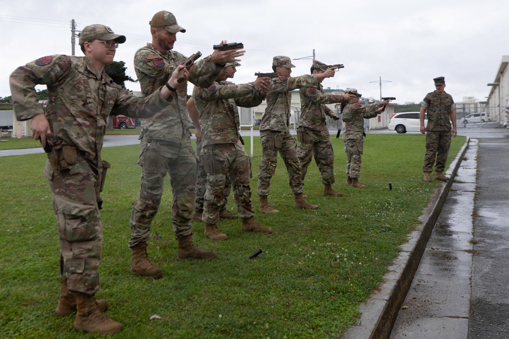 3rd Maintenance Battalion Combat Marksmanship Coaches Provide Pistol Familiarization to Space Force 161 Electromagnetic Warfare Combat Detachment