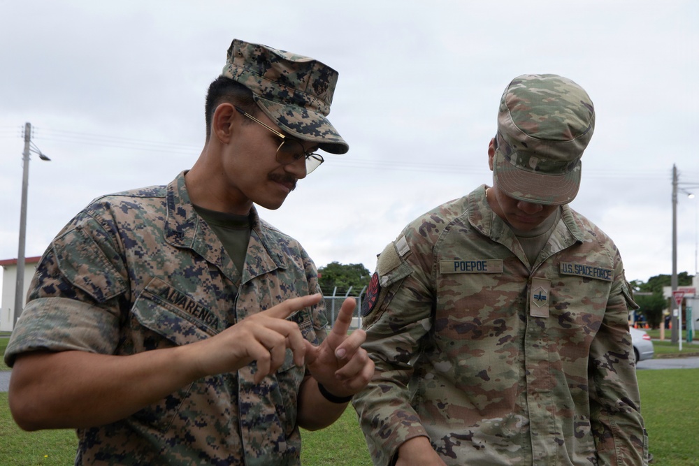 3rd Maintenance Battalion Combat Marksmanship Coaches Provide Pistol Familiarization to Space Force 161 Electromagnetic Warfare Combat Detachment