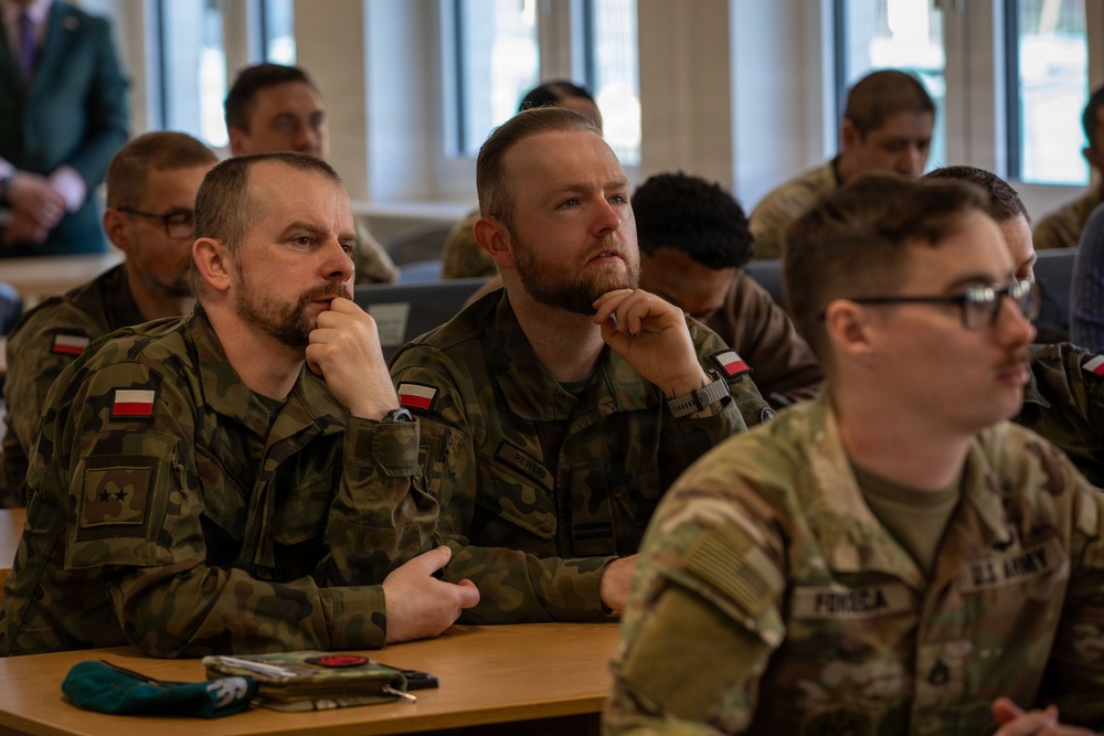 U.S. and Polish Army Personnel Receive Challenge Coins During a Physical Security Officer Course
