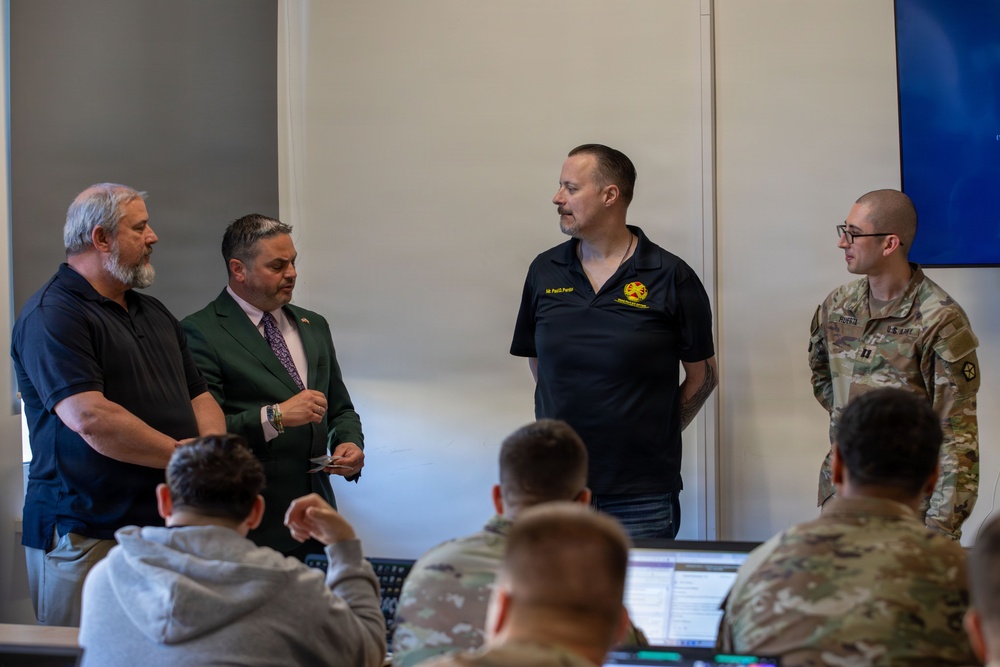 U.S. and Polish Army Personnel Receive Challenge Coins During a Physical Security Officer Course