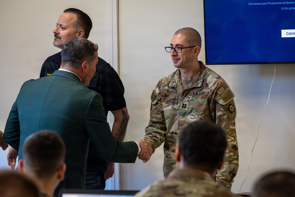 U.S. and Polish Army Personnel Receive Challenge Coins During a Physical Security Officer Course