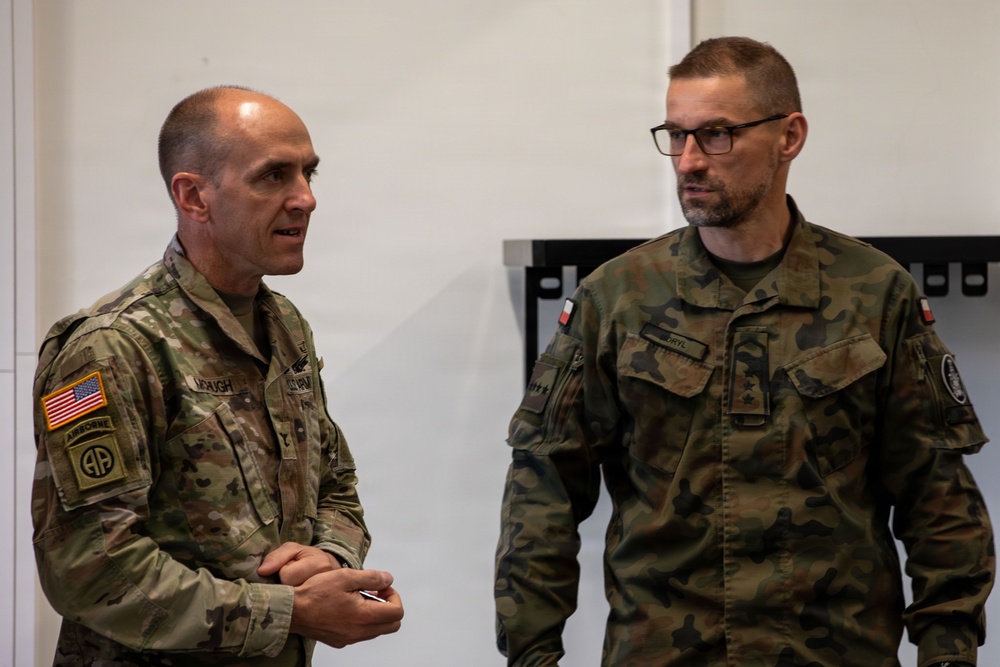 U.S. and Polish Army Personnel Receive Challenge Coins During a Physical Security Officer Course