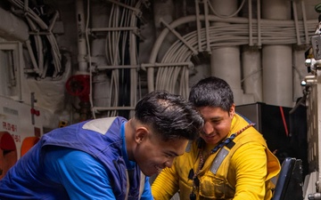 Boxer’s Morale Dog Comforts Sailors