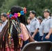 San Antonio local watches marching at 135th Battle of Flowers Parade