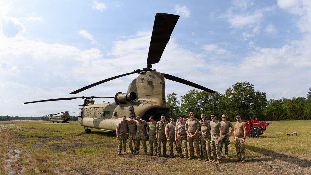 South Carolina National Guard Chinook unit recovers damaged aircraft from field in Savannah
