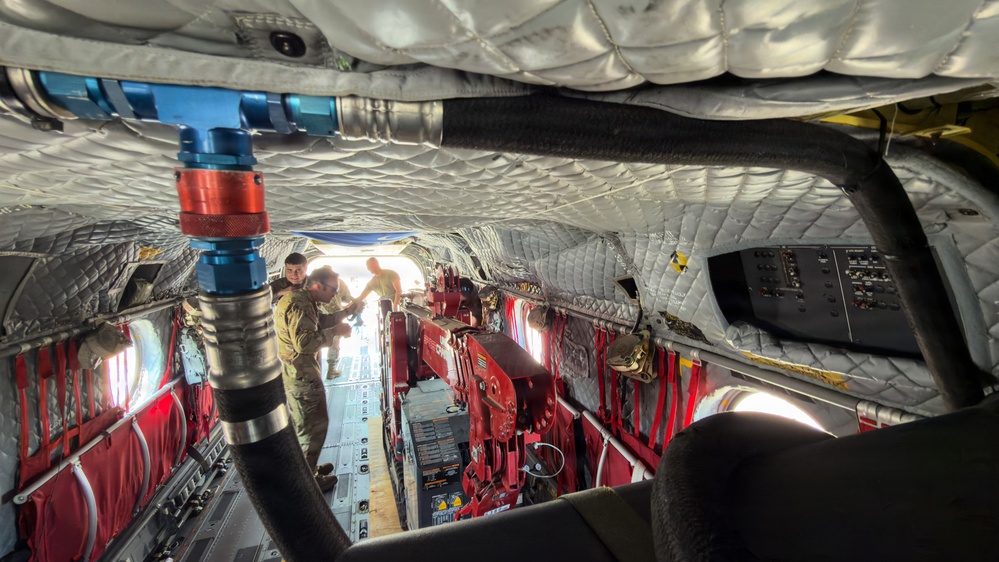 South Carolina National Guard Chinook unit recovers damaged aircraft from field in Savannah