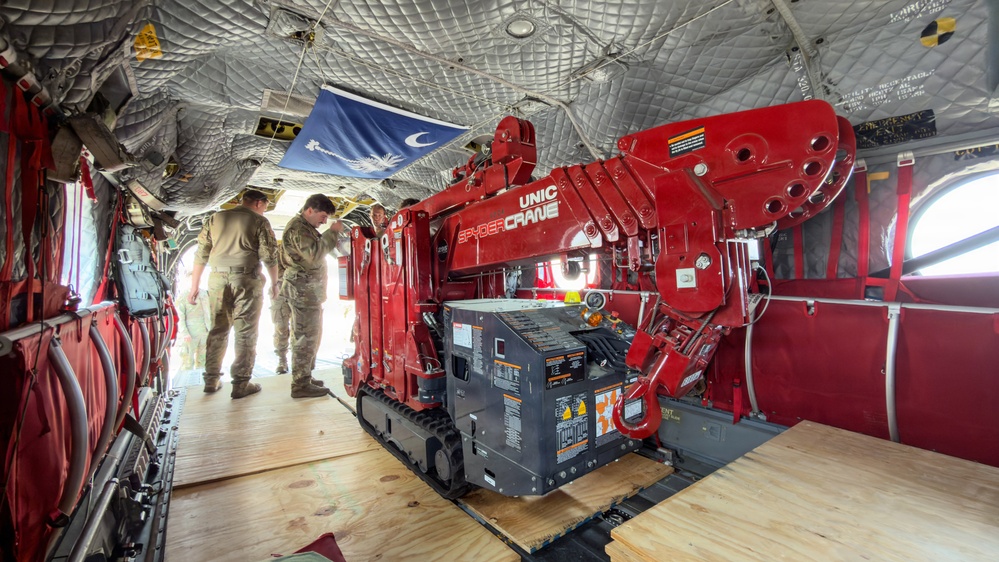 South Carolina National Guard Chinook unit recovers damaged aircraft from field in Savannah