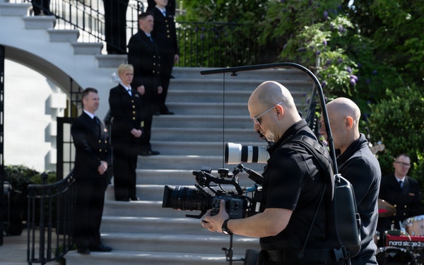 Navy Band Sea Chanters rehearse for arrival of King Charles III