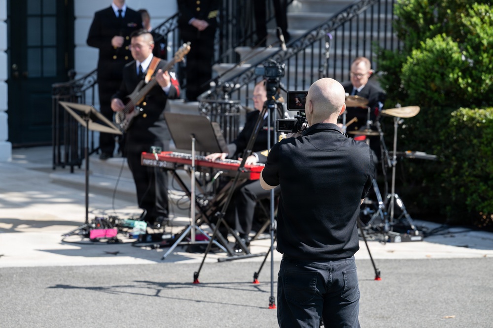 Navy Band Sea Chanters rehearse for arrival of King Charles III