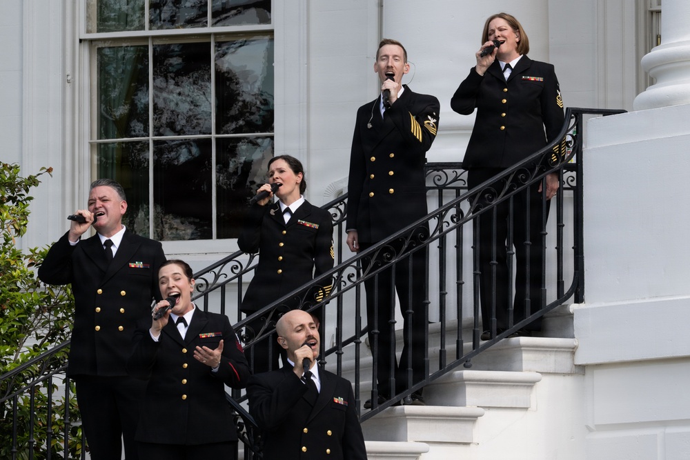Navy Band Sea Chanters rehearse for arrival of King Charles III