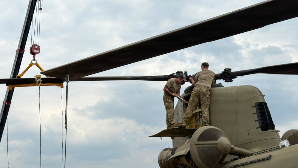 South Carolina National Guard Chinook unit recovers damaged aircraft from field in Savannah