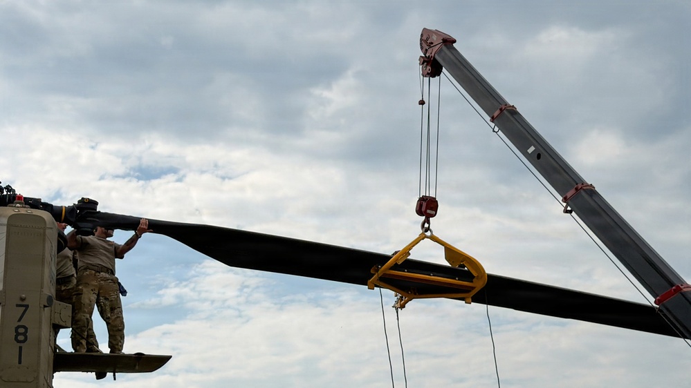 South Carolina National Guard Chinook unit recovers damaged aircraft from field in Savannah