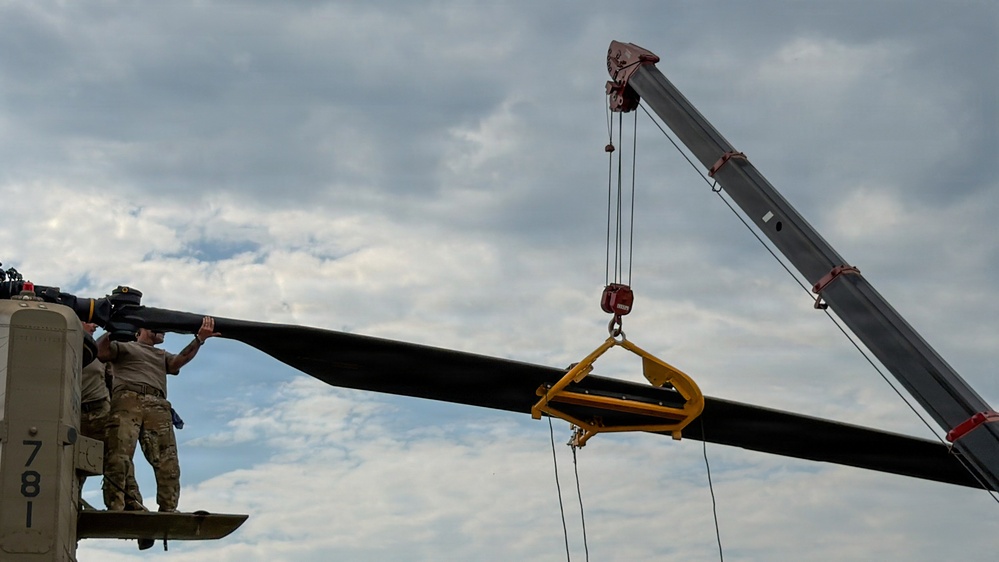 South Carolina National Guard Chinook unit recovers damaged aircraft from field in Savannah