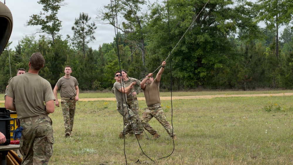 South Carolina National Guard Chinook unit recovers damaged aircraft from field in Savannah