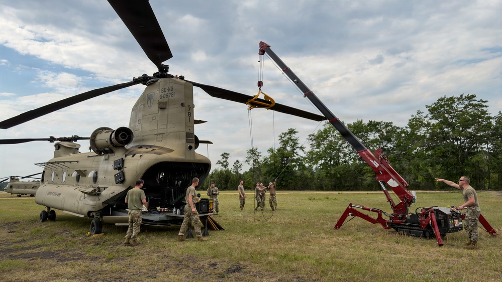 South Carolina National Guard Chinook unit recovers damaged aircraft from field in Savannah