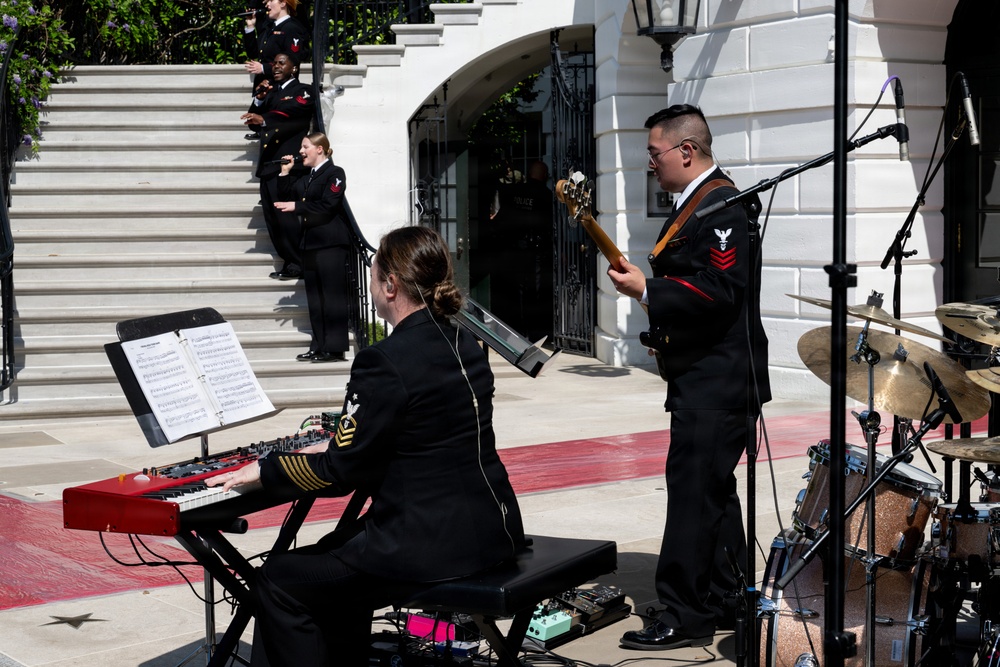 Navy Band Sea Chanters rehearse for arrival of King Charles III