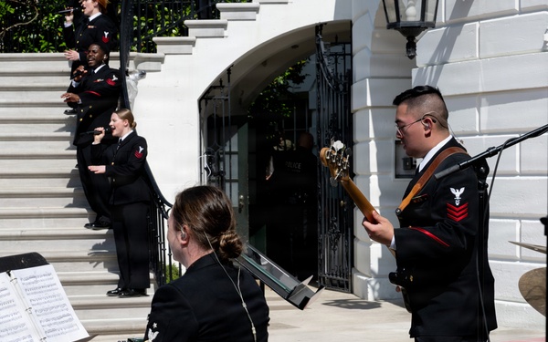 Navy Band Sea Chanters rehearse for arrival of King Charles III