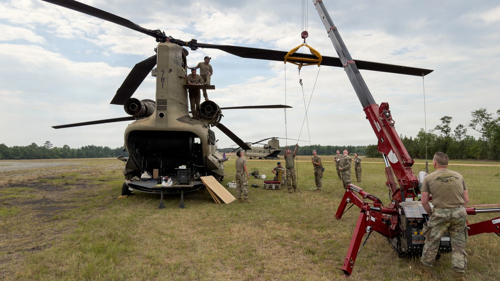 South Carolina National Guard Chinook unit recovers damaged aircraft from field in Savannah