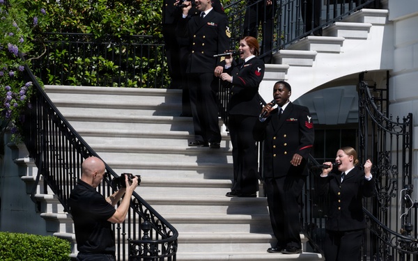 Navy Band Sea Chanters rehearse for arrival of King Charles III