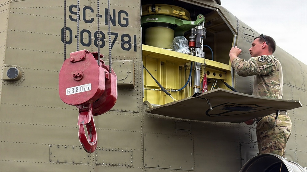South Carolina National Guard Chinook unit recovers damaged aircraft from field in Savannah
