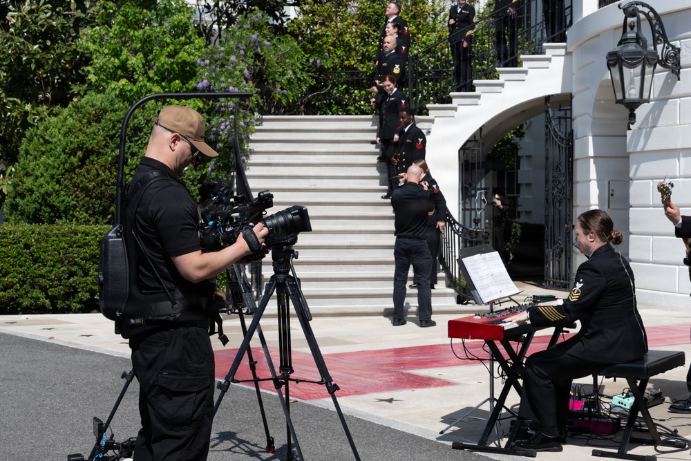 Navy Band Sea Chanters rehearse for arrival of King Charles III