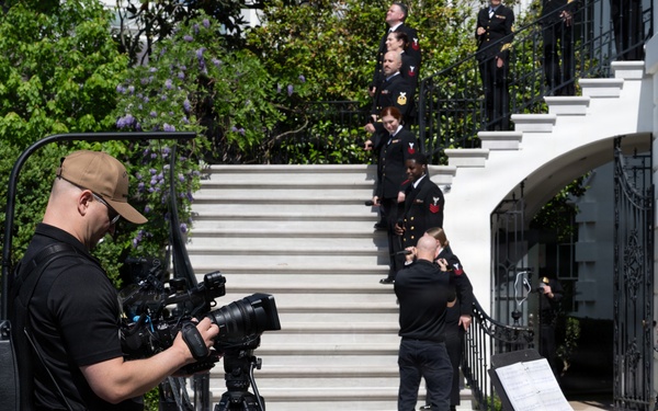 Navy Band Sea Chanters rehearse for arrival of King Charles III