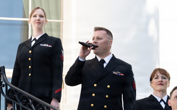Navy Band Sea Chanters rehearse for arrival of King Charles III