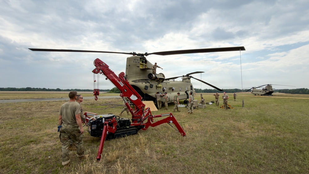 South Carolina National Guard Chinook unit recovers damaged aircraft from field in Savannah