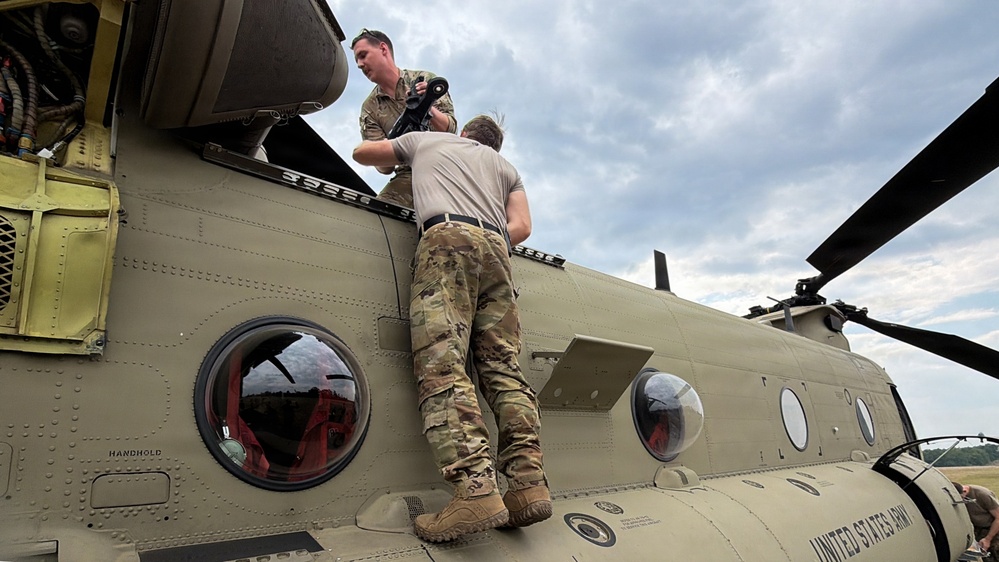 South Carolina National Guard Chinook unit recovers damaged aircraft from field in Savannah